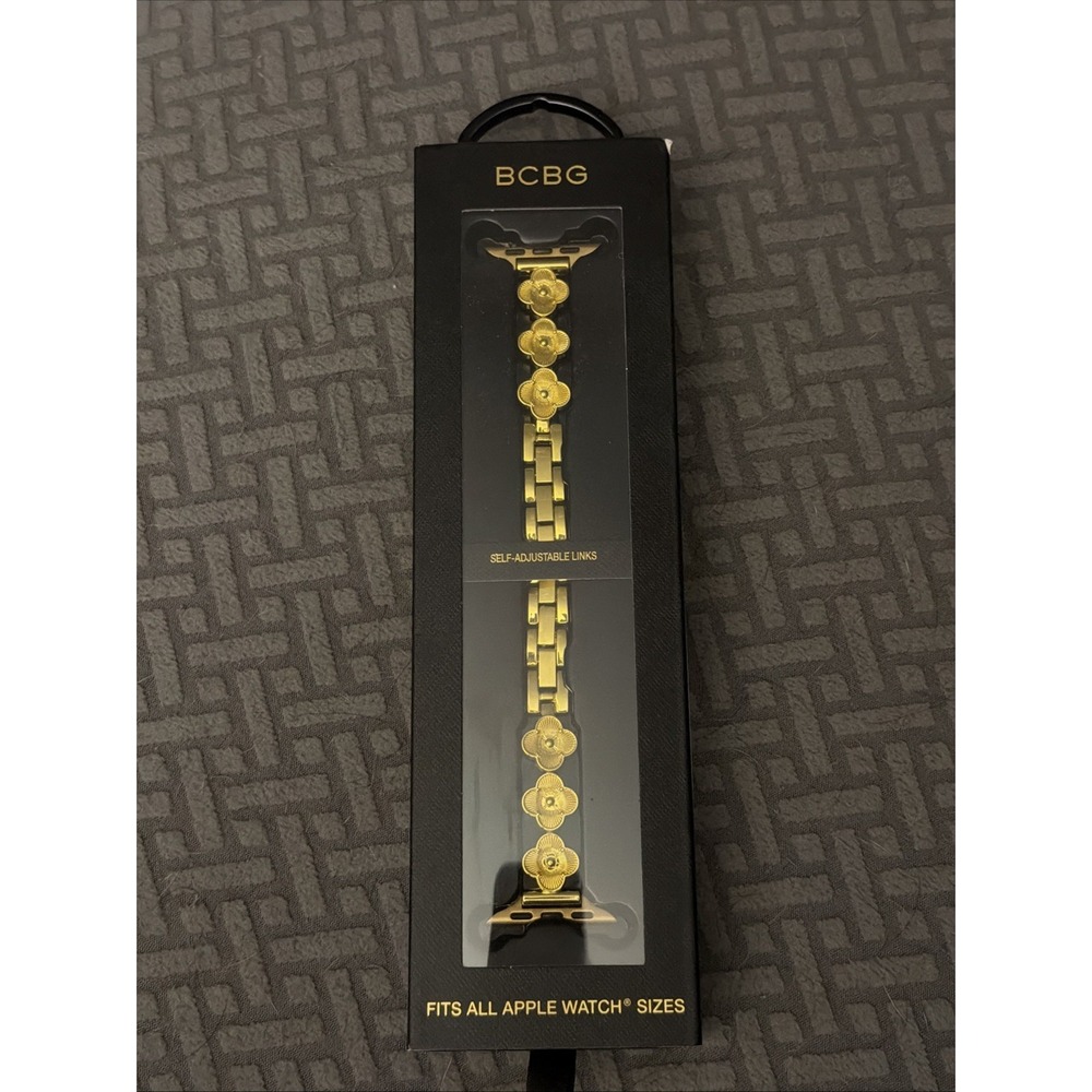 BCBG gold-tone clover link bracelet designed for Apple Watches.